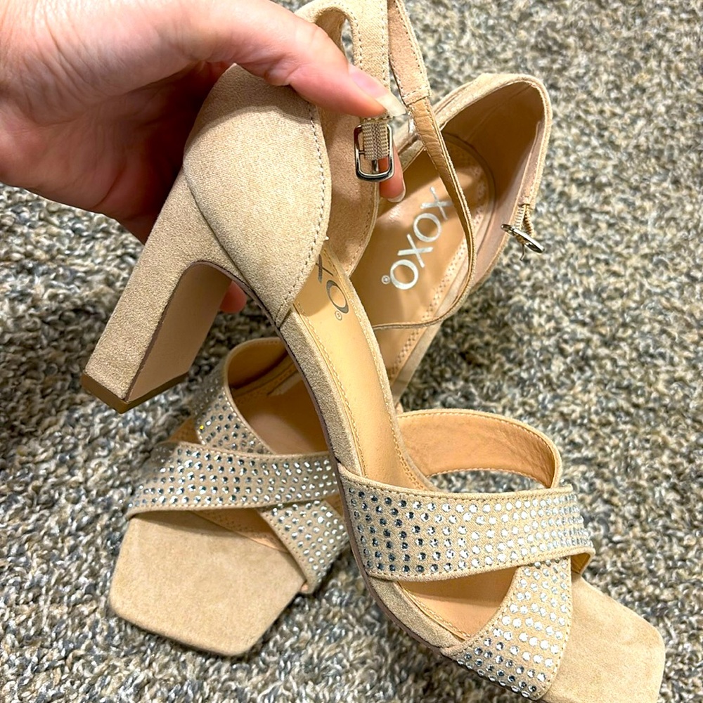 A heel shoes, the brand is xoxo.